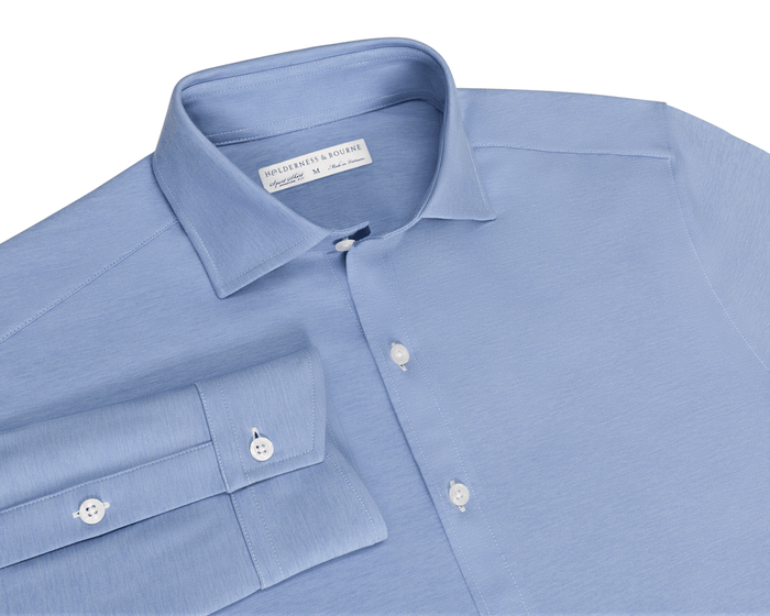 The Cullinane Shirt: Heathered Maidstone Blue, light-blue button-down, long-sleeve with point collar, white buttons, featuring breathable, stretchable cotton-blend performance pique by Holderness & Bourne.