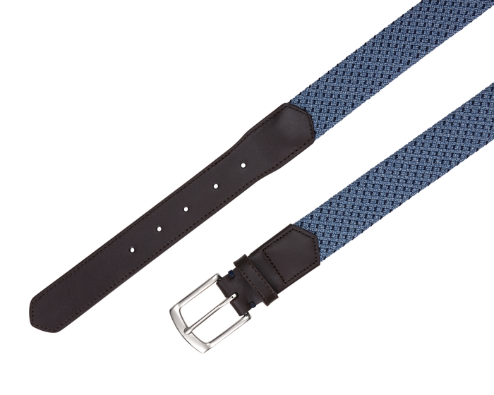 The Fischer Belt: Slate & Navy Basketweave features a blue woven fabric with dark brown leather ends and a silver-tone buckle for stylish flexibility.