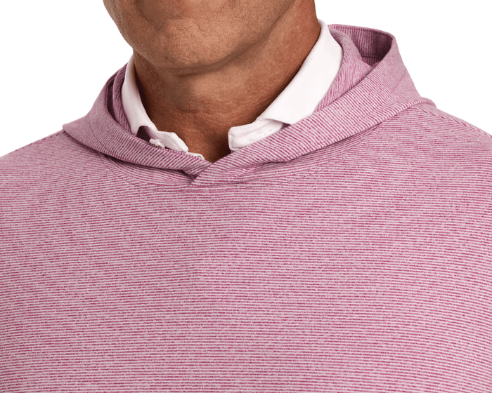 The Hamilton Hoodie: Heathered Cabernet & White, shown on a person, features a light pink striped pattern over a white collared shirt, highlighting its soft, stretchy fabric.