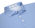 The Hanover Shirt: Maidstone Blue, a slim-fit men's button-down with spread collar, features a blue geometric pattern on white, offering comfort and sun protection.