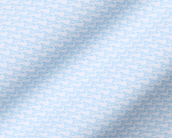 The Hanover Shirt: Vista Blue features a light fabric with a micro-pattern of stylized birds, showcasing gentle folds and intricate textile weave.