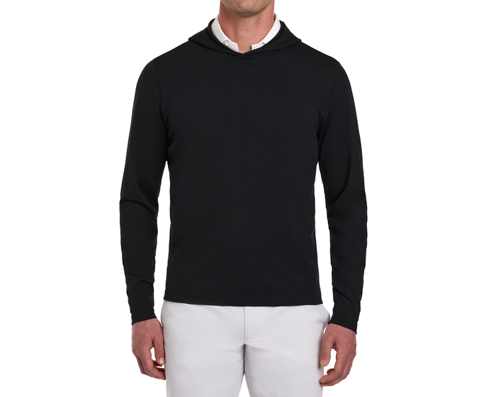 The Jackson Hoodie: Black, slim-fit, long-sleeve, worn over a white collared shirt, ideal for golf with its sleek, drawstring-free design.