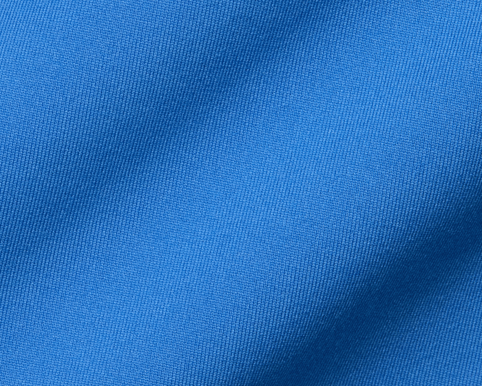 Close-up of The Jackson Boys Hoodie: Horizon Blue, showcasing its fine blue knitted fabric and gentle fold, highlighting its lightweight, streamlined design with 4-way stretch.