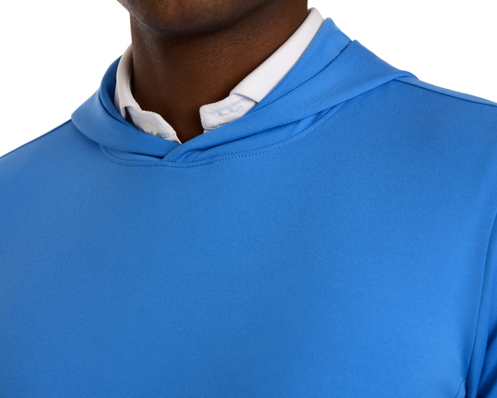 Close-up of The Jackson Hoodie: Horizon Blue, showcasing its streamlined design over a white collared shirt, ideal for golf with no extraneous details.