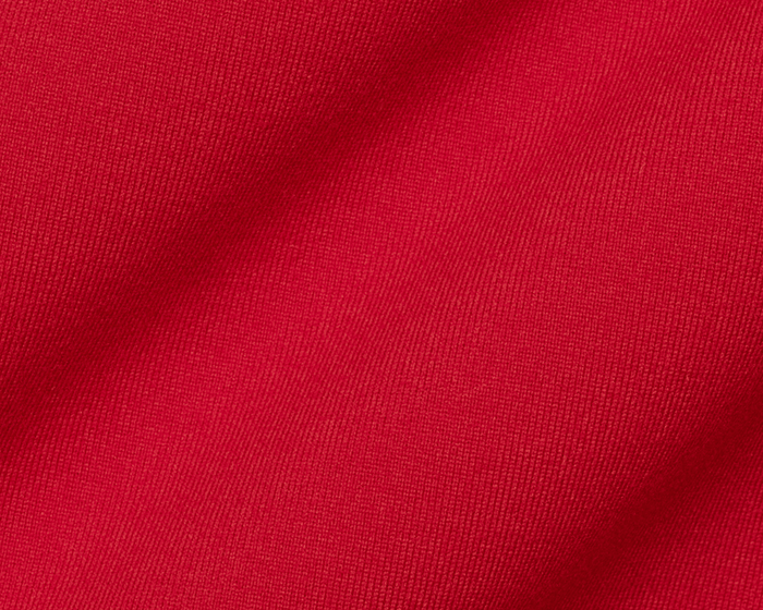 Close-up of The Jackson Hoodie: Liberty, showcasing its fine knit texture. Lightweight and minimalist design, ideal for golfing, with no obstructive drawstrings or pouches.