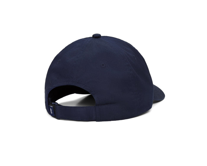 Back view of The Lightweight Cotton Hat: Navy with Transfusion Icon, showcasing its adjustable strap and low-profile design, ideal for sun protection and comfort.