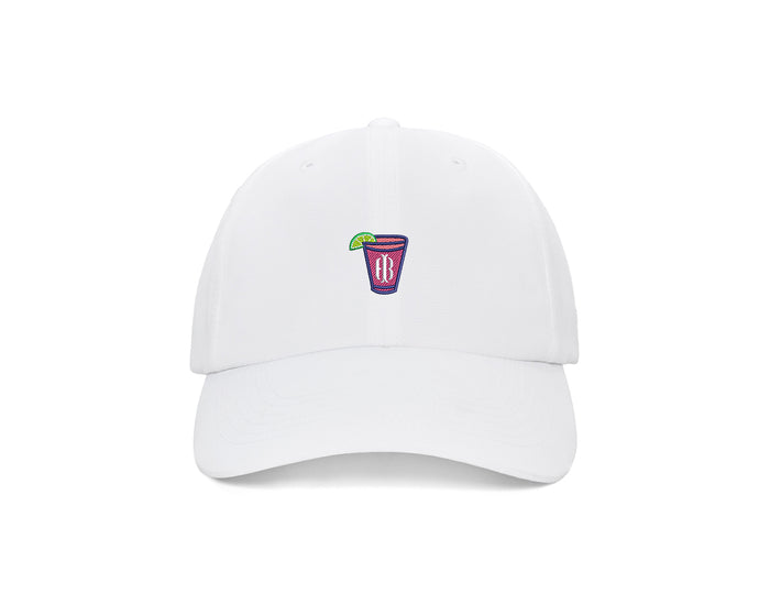 The Lightweight Performance Hat: White with Transfusion Icon features a six-panel design, adjustable closure, and an embroidered cocktail patch with a lime wedge.
