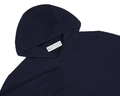 The Logan Hoodie Sweater: Heathered Navy, a navy-blue, hooded knit pullover featuring ribbed cuffs, a woven back label, and a minimalist design from Holderness & Bourne.
