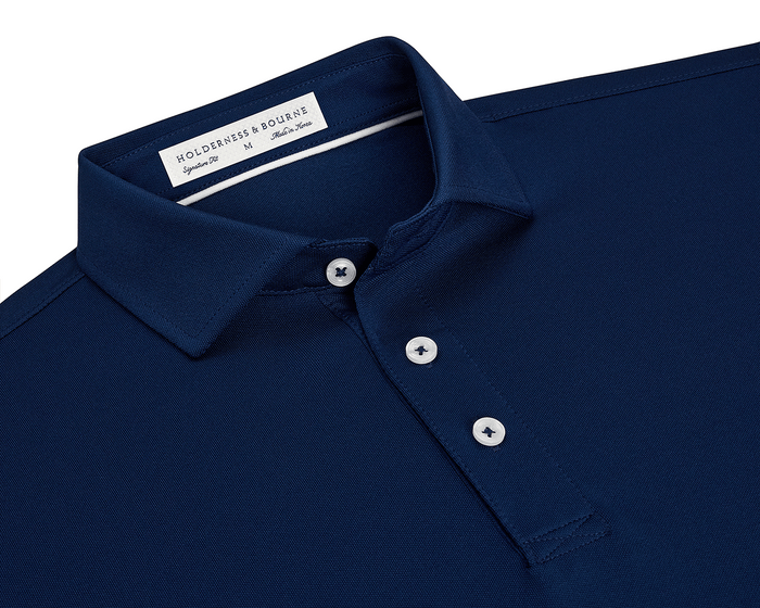The Macdonald Shirt: Navy, featuring a classic point collar, three-button placket, and contrast collar band piping, offering breathable comfort with a structured spread collar.