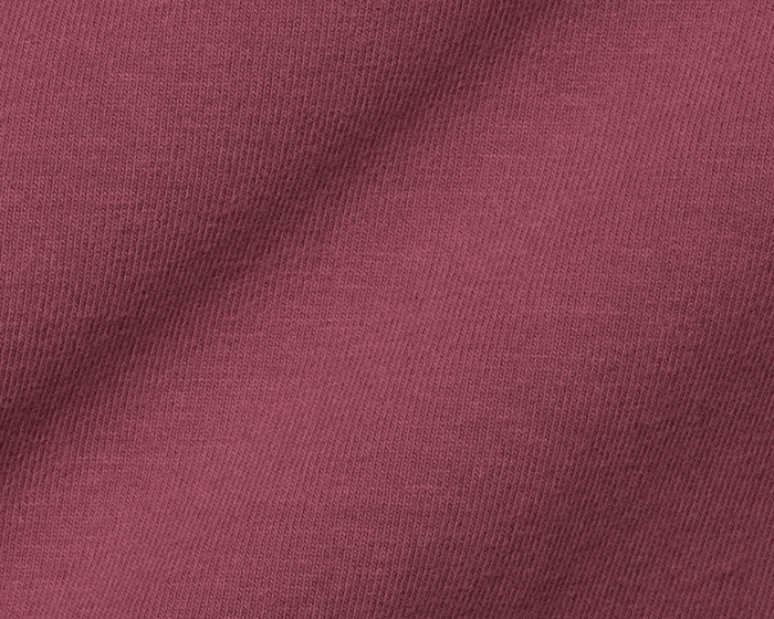 Close-up of The Mason T-Shirt: Cabernet, showcasing its fine knit texture made from luxurious Peruvian pima cotton, highlighting comfort, style, and durability.