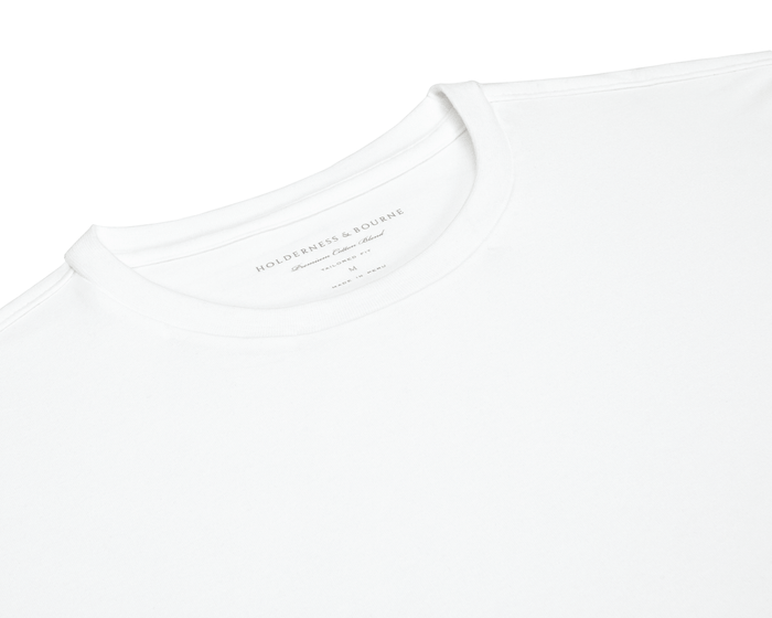 The Mason T-Shirt: White, featuring a tailored fit and premium Peruvian pima cotton blend, laid flat with visible inner neck label details.
