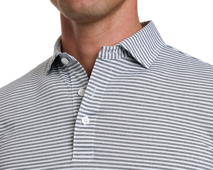 The Maxwell Shirt: Gray & White, featuring a striped knit pattern, structured collar, and three-button placket, crafted for comfort and enhanced moisture wicking.