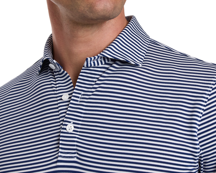 The Maxwell Shirt: Navy & White, showcasing its structured spread collar and two-button placket, made from stretchy performance pique for comfort and moisture-wicking.