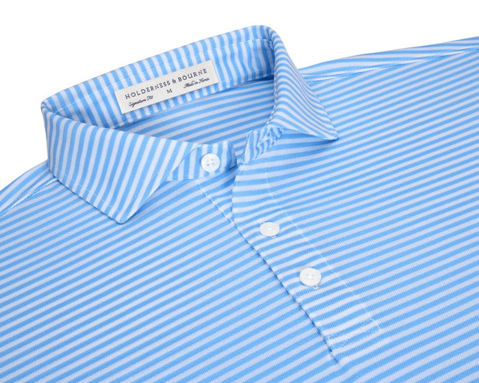 The Maxwell Shirt: Vista Blue & White, featuring fine stripes, a structured spread collar, three-button placket, and moisture-wicking performance pique for comfort.
