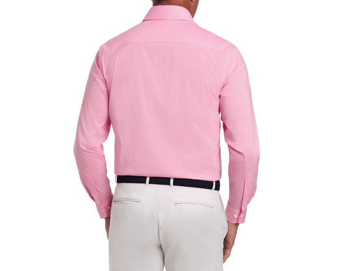 The McAllister Shirt: Belmont, shown from the back, highlights its tailored fit and luxurious micro gingham fabric, tucked into light trousers with a woven belt.