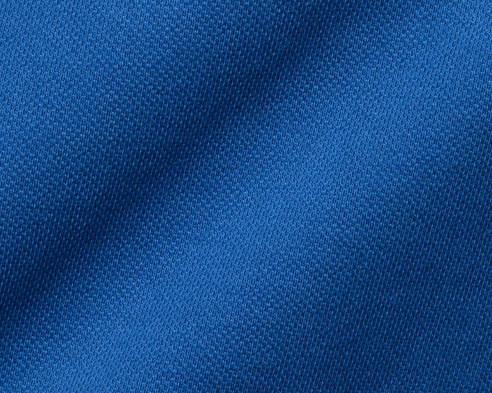 The Neville Shirt: Maidstone Blue, featuring a close-up of its textured knit fabric, showcasing the soft and durable Peruvian Pima cotton blend.