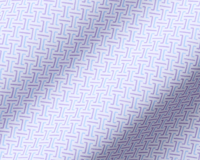 The Norwood Shirt: Vista Blue & Tudor features a woven geometric pattern with T-shaped motifs, showcasing subtle folds and a structured spread collar.