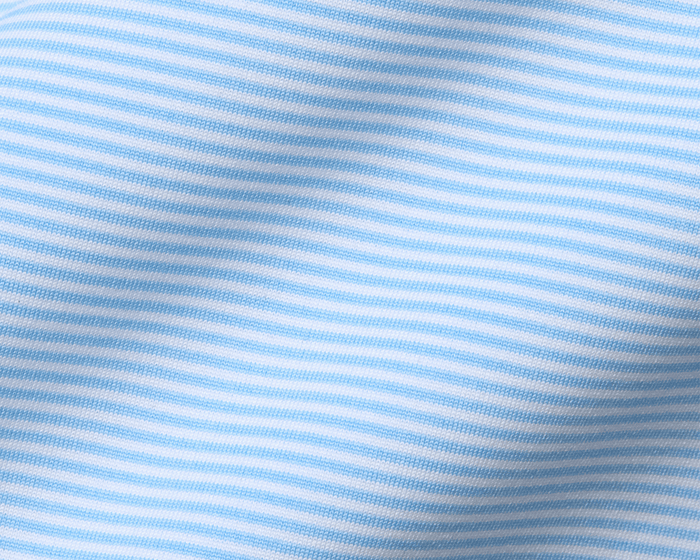The Perkins Shirt: Vista Blue & White features fine horizontal stripes on a soft, lightweight knit fabric, offering four-way stretch and a structured spread collar.