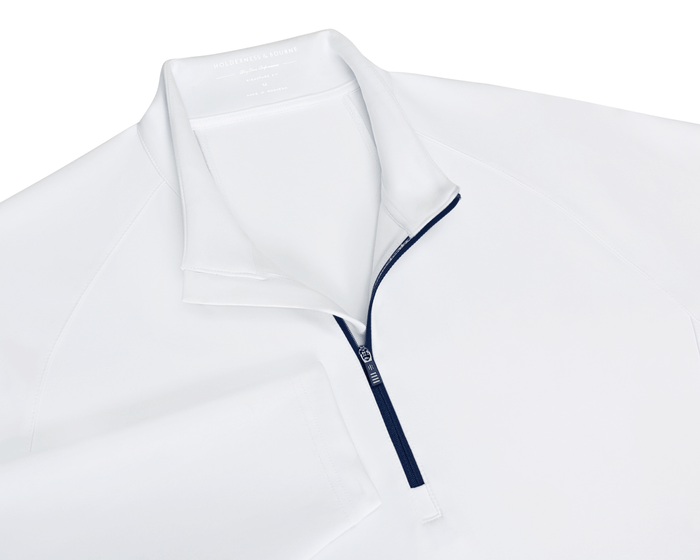 The Rodgers Quarter-Zip: White, featuring a navy-blue zipper, stand-up collar, and low-profile side pockets, ideal for golf with UPF 50+ protection.