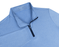 The Royce Quarter-Zip: Heathered Horizon Blue features light-blue pin-stripes, a navy quarter-zip, and a soft collar, ideal for versatile layering.