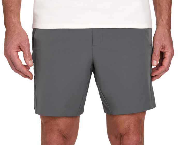 The Saunders Short: Iron Gray, shown on a person from waist to mid-thigh, features quick-drying fabric, side pockets, and a zip pocket.
