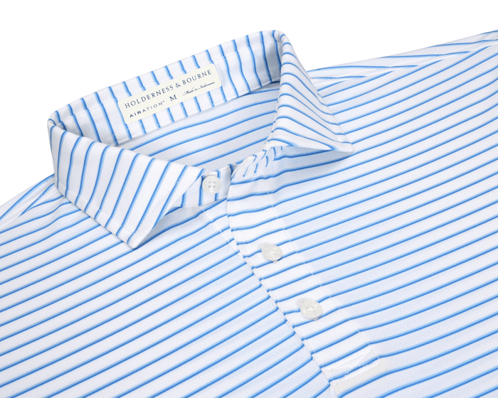 The Springer Shirt: White/Vista Blue/Horizon Blue with thin stripes, point collar, three-button placket, and AIRATION™ fabric for breathability and UPF 50+ protection.