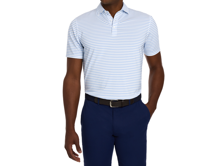 The Springer Shirt features thin horizontal stripes, a structured spread collar, and a fitted design, paired with dark navy trousers and a black leather-weave belt.