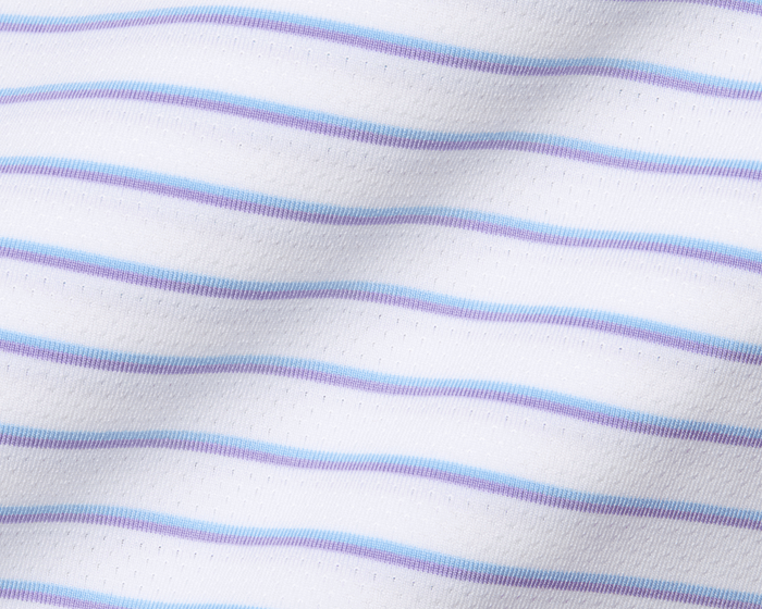 The Springer Shirt: White/Vista Blue/Tudor features ultra-breathable, perforated knit fabric with thin blue and lavender stripes, offering UPF 50+ protection and moisture wicking.