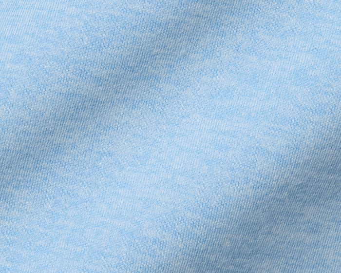 Close-up of The Stowe Hoodie in Heathered Vista Blue, showcasing its light-blue, finely knitted texture, highlighting its ultra-soft, performance fabric for comfortable layering.