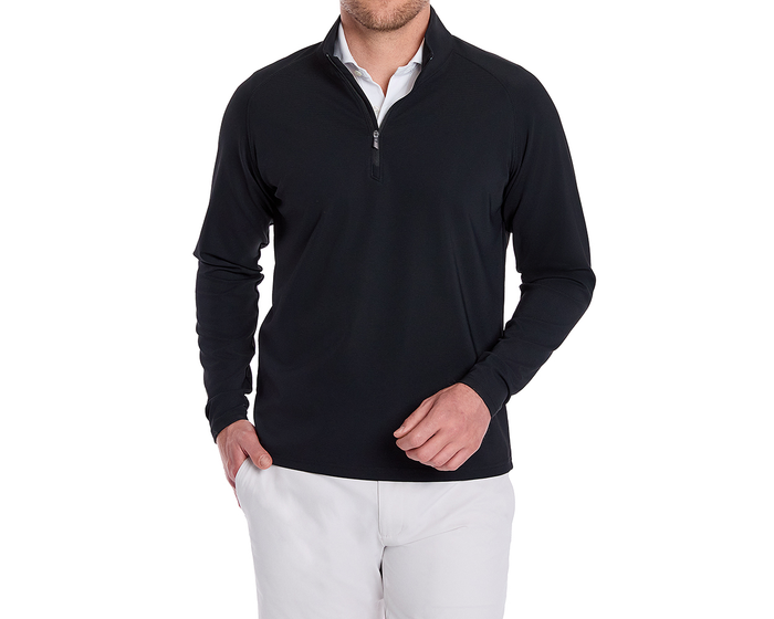 The Stuart Quarter-Zip: Black, shown on a male model, features a lightweight, textured rib fabric with a mock-neck collar and mid-chest zipper, paired with light pants.