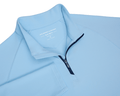 The Stuart Quarter-Zip: Vista Blue, a lightweight performance pullover with a ribbed collar and navy zipper, showcasing a luxurious blend and subtle textured fabric.