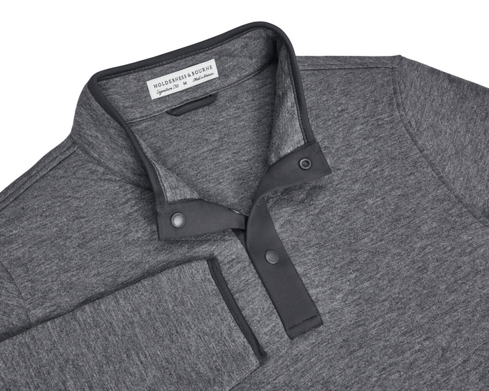 The Sullivan Quarter-Snap: Heathered Charcoal pullover with a stand-up collar, partial snap-button placket, buttery fabric, and diamond-quilted insulation for warmth.