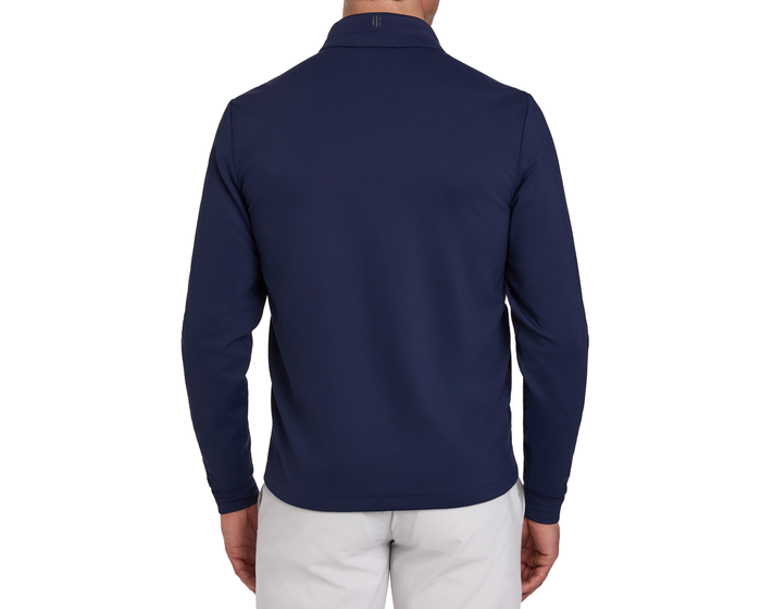 Navy long-sleeve golf jacket worn by a person on a white background