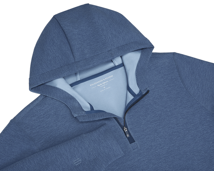 The Tilley Quarter-Zip Hoodie: Heathered Andover, showcasing a sleek pullover with a soft contrast-lined interior, ideal for versatile, midweight performance wear.