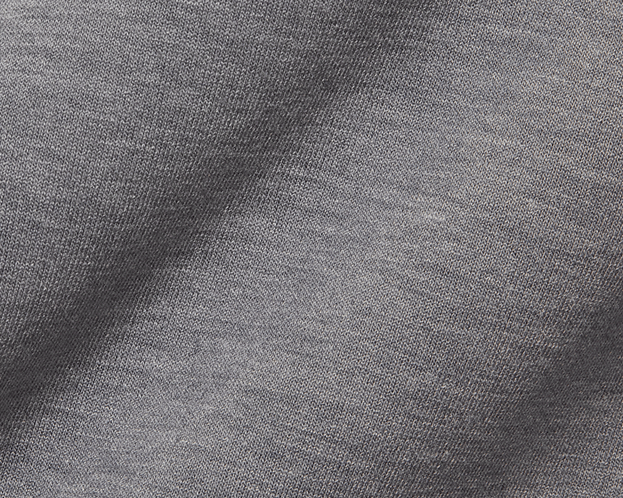 The Tilley Quarter-Zip Hoodie: Heathered Charcoal showcases fine knitted loops of a soft, midweight fabric, ideal for versatile, cool-weather wear.
