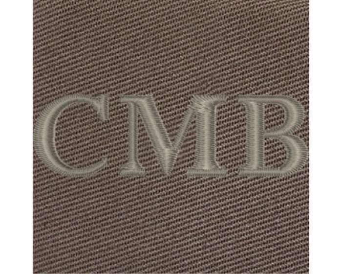 Close-up of The Travis Tote Bag Cotton Twill: Scotch Green, showcasing CMB embroidery on durable, tightly woven fabric, highlighting personalization detail.