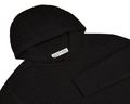 The Wallace Hoodie Sweater: Black features a quilted knit, ribbed hood and cuffs, and a label reading “Holderness & Bourne, Signature Fit, M.”