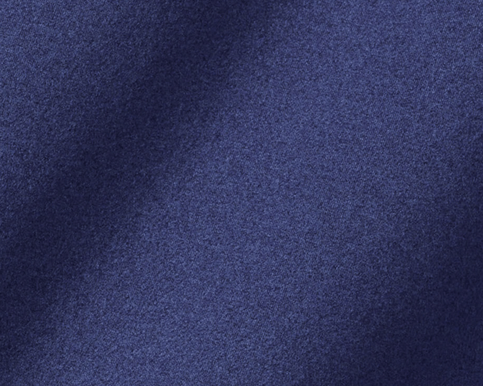 Close-up of The Westland Quarter-Zip: Navy, showcasing its fine, mottled texture and soft, moisture-wicking fabric, ideal for versatile wear.