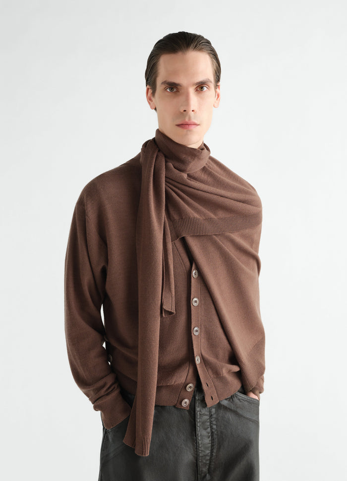 Trompe L'Oeil scarf in brown merino blend wool worn by model with buttoned cardigan by LEMAIRE front view