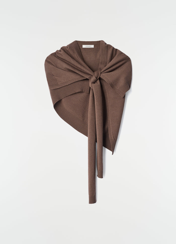 Trompe L'Oeil scarf in brown merino blend wool with knot detail LEMAIRE styled against white background