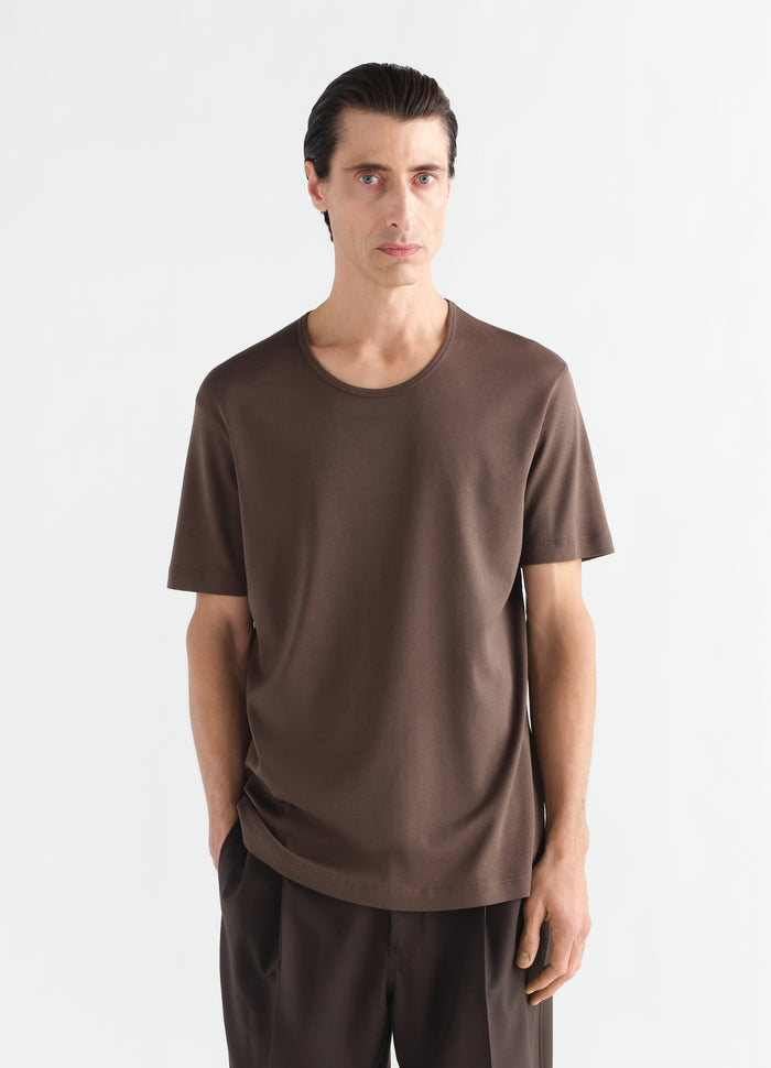 Scoop-neck brown ribbed jersey T-shirt worn by a model front view LEMAIRE main look