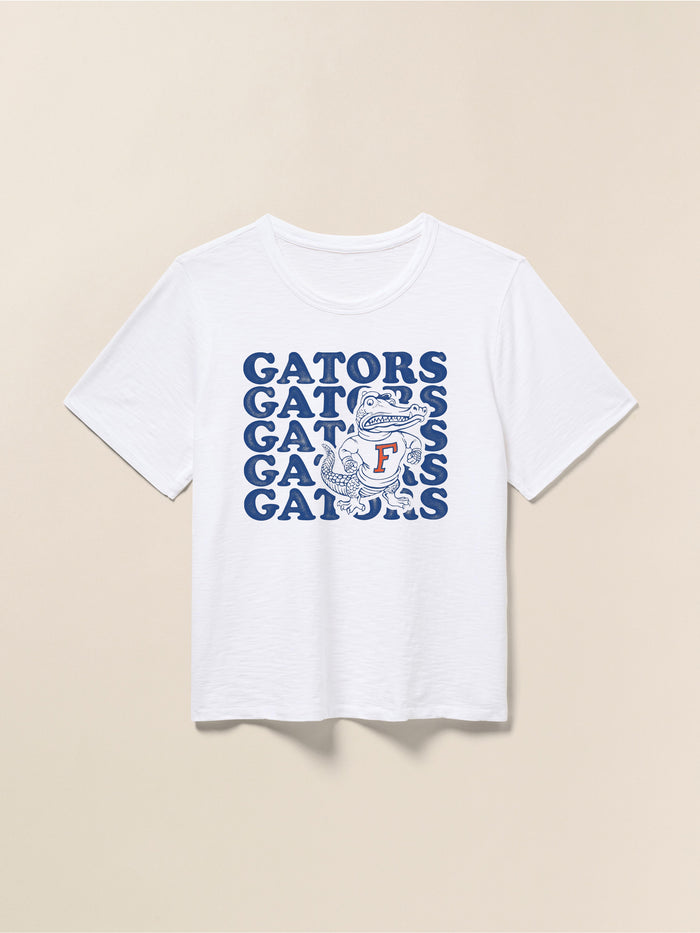 White t-shirt with blue Florida graphic against a beige background
