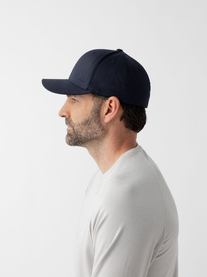 Side view of man wearing navy urban classic hat |Color:Dark Navy