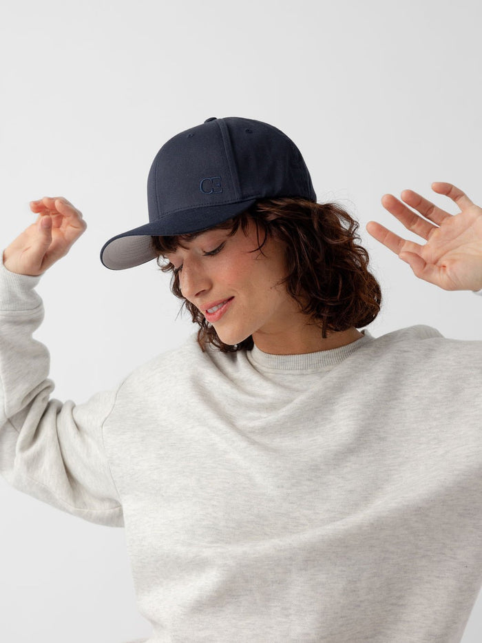 Side view of woman wearing navy urban classic hat |Color:Dark Navy