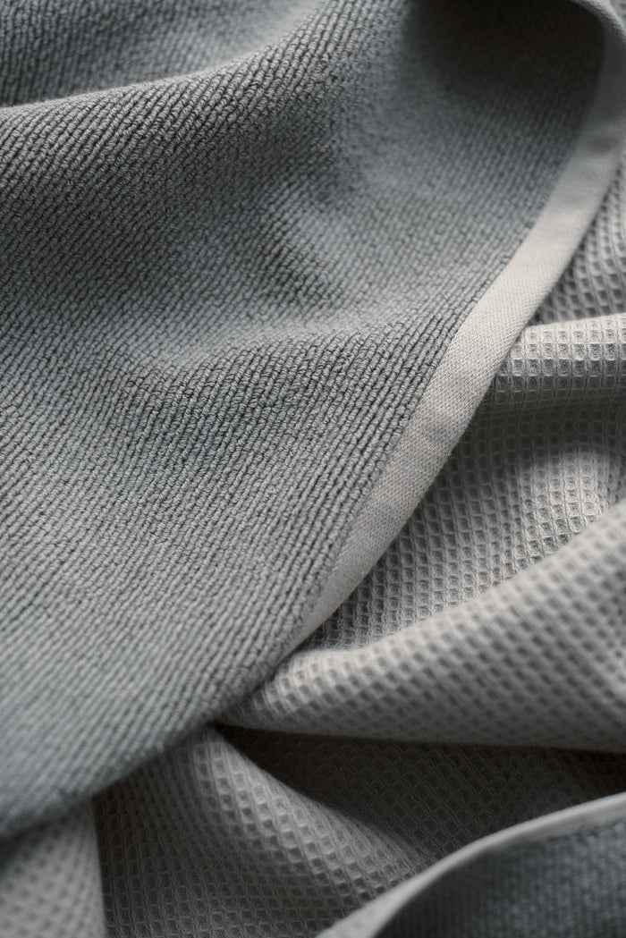 Waffle Bath Towel in the color Charcoal. Photo of Charcoal Waffle Bath Towel taken close up showing only the Charcoal. |Color:Charcoal