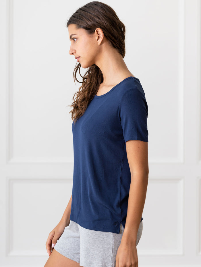 Woman wearing a blue Cozy Earth Rib Knit Short Sleeve Lounge Top and gray shorts against a white background |Color:Navy