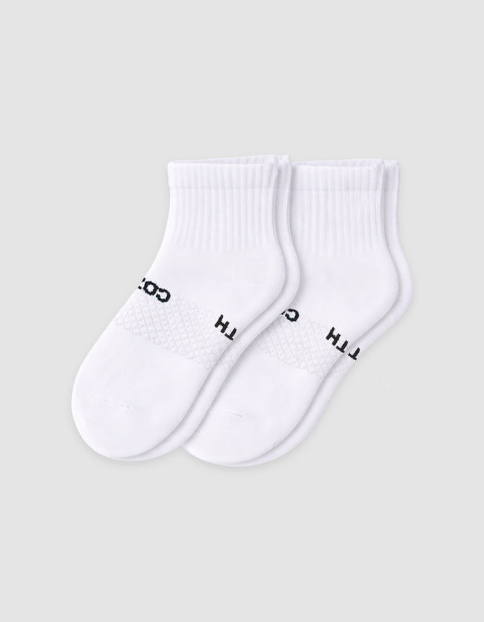 The Cozy Earth Men's Essential Quarter Sock features white ribbed cuffs and a discreet black text design on the sides, displayed against a plain light background.|Color:White