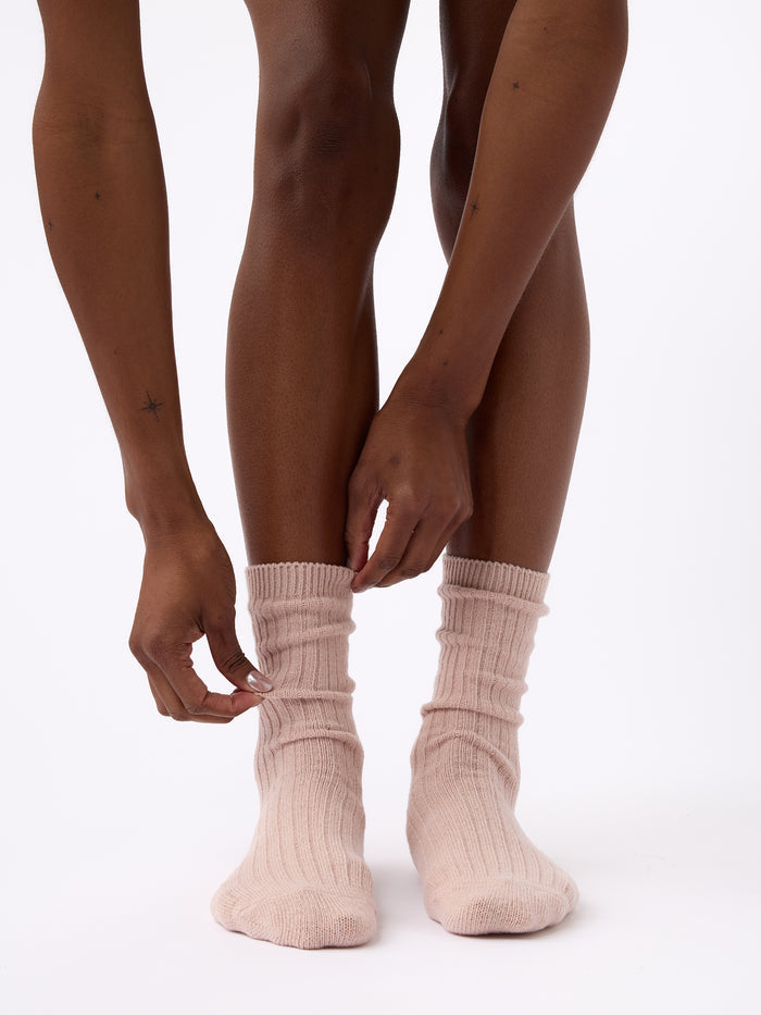 Person wearing Cozy Earth Plush Lounge Calf Sock 1-Pack in Dusty Rose |Color:Dusty Rose