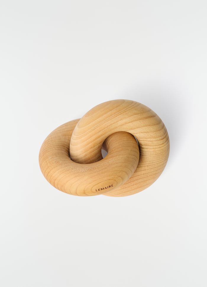 Wood Link M wooden accessory in natural finish by LEMAIRE on plain white background close-up detail