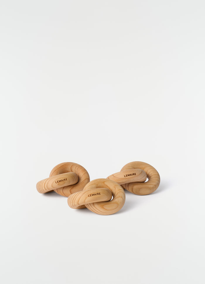 Wood Link Trio XS natural wood links with LEMAIRE logo detail on plain white background